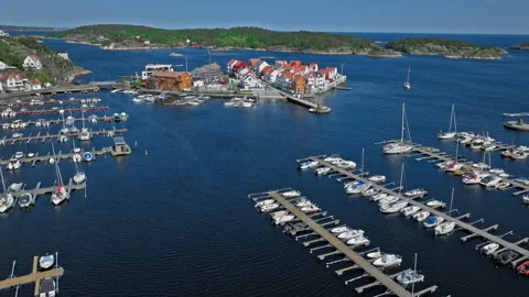 Aerial view of Risor Norway marina with boats, colourful waterfront buildings. Stock Footage 328125704