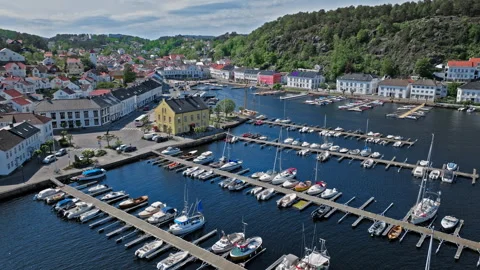 Aerial view of Risor Norway marina with boats and historic waterfront buildings. Stock Footage 328126564