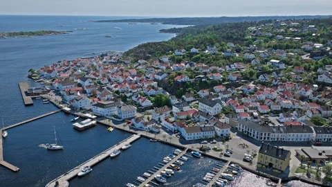 Aerial view of Risor Norway showing colourful waterfront houses and marina. Stock Footage 328125848