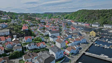 Aerial view of Risor Norway with white wooden houses and red roofs. Stock Footage 328125117