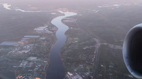 Aerial View of River From Airplane at Sunset Concept of Natural Flow Stock-Footage 336462125