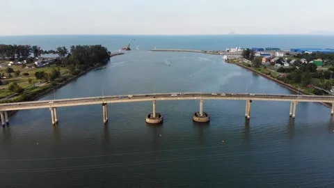 Aerial view of the river and the bridge. Tok Bali bridge at Bachok, Kelantan. Stock Footage 138371258