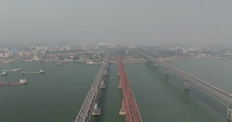 Aerial view of river and bridge with cityscape, Bangladesh. Stock Footage 303973814