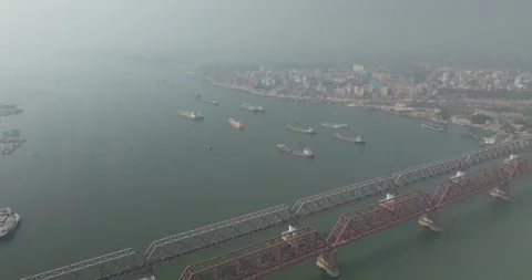 Aerial view of river and bridge with mist, Bangladesh. Stock Footage 303973872