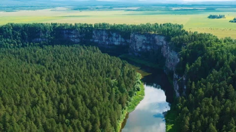 Aerial view of river and cliffs, forest, fields Stock-Footage 169478481
