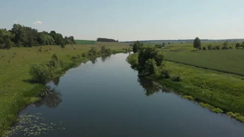 Aerial view of River and Fields. Travel, Adventure and Picturesque Famous Stock Footage 111230771