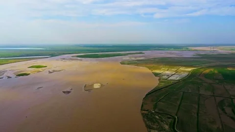 Aerial view of the river and plain agriculture Stock Footage 293938919