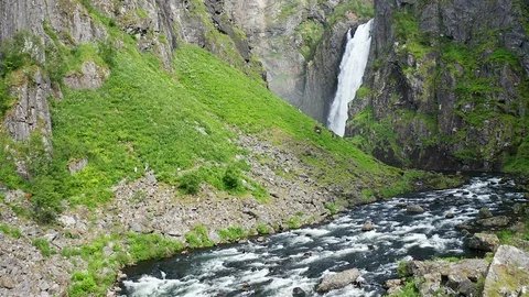 Aerial view of a river and waterfall in nature with rainbow. Stock Footage 116861884