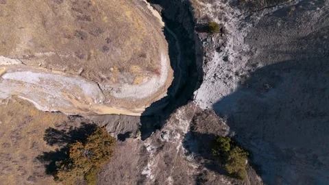 Aerial view of river bed and bluff Stock Footage 306091617