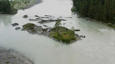 Aerial view of the river between tree forest at sunset. Altai Russia. Stock Footage 121369419