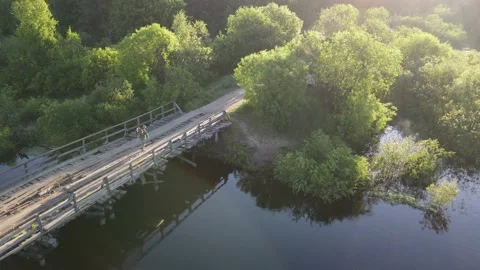 Aerial view of the river bridge and forest Stock Footage 199985247