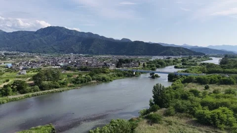 Aerial View of River Bridge and Town in Nagano Japan Stock Footage 336617093