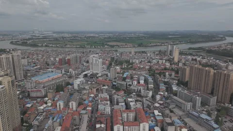 Aerial View of River-Crossing Bridge in Downtown Hanchuan Stock-Footage 343694542