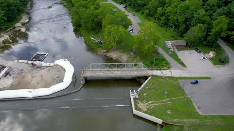 Aerial view of river dam and bridge removal and waterway restoration project 動画素材 340486464