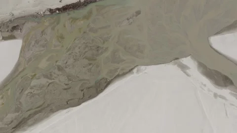 Aerial View of a River Delta and White Sand Dunes in Pakistan 스톡 동영상 314458069