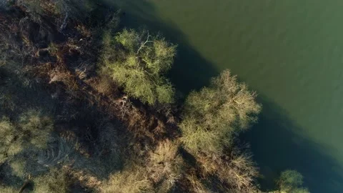 Aerial view of a river in early spring, rural countryside environment, top down Stock Footage 152144931