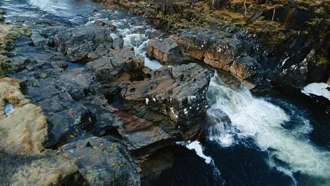 Aerial view of river Etive &amp; rapid falls near Glencoe &amp; Glen Etive, Scotland, UK Stock Footage 86490926