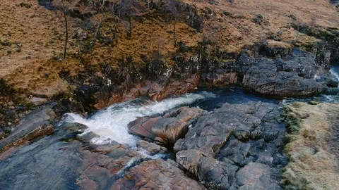 Aerial view of river Etive &amp; rapid falls near Glencoe &amp; Glen Etive, Scotland, UK Stock Footage 86491236
