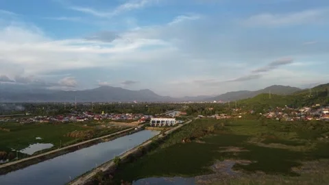 Aerial view of river with fields. Aerial view of rural landscape in the evening Stock Footage 248937940