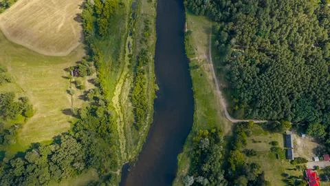 Aerial View of River, Fields, and Forest in Nowy Lubiel, Poland Stock Photos