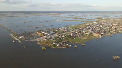Aerial view of the river flood and the city Stock Footage 190990906