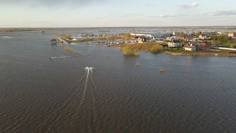Aerial view of the river flood and the city Stock Footage 190998089