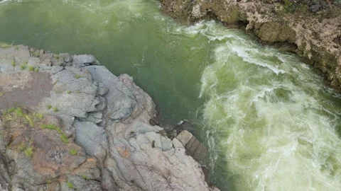 Aerial view of River flow near the cliffs. Stock Footage 285477149