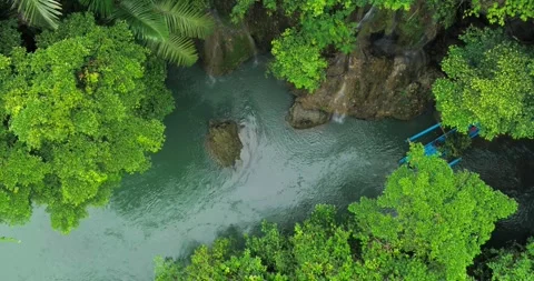 Aerial View of River Flow Over Rocky Canyon in Tropical Jungle 스톡 동영상 332414852