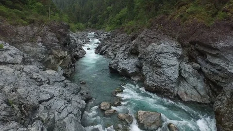 Aerial View of a river flowing through a mountain pass Video stock 71182738