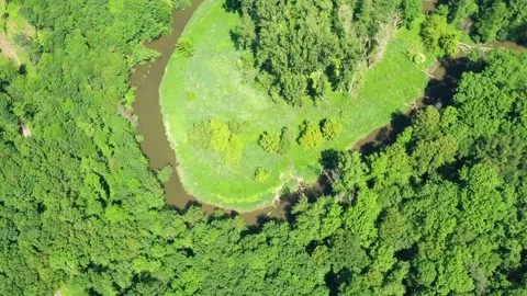 Aerial view of a river flowing through a beautiful landscape Stock Footage 148039542