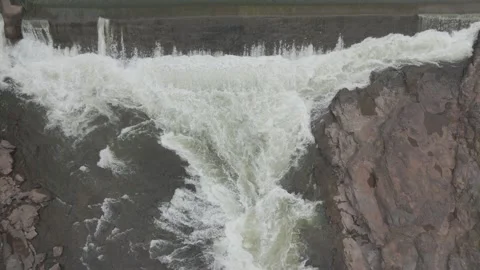 Aerial view of river flowing through the rock area. Video stock 285476700