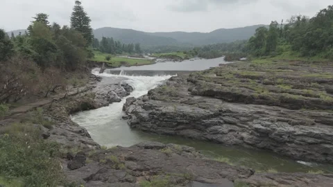 Aerial view of river flowing through the rock area. Stock Footage 285585448