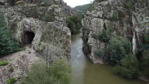 Aerial View of River Flowing Through Majestic Rock Formations Stockbeeldmateriaal 312751975