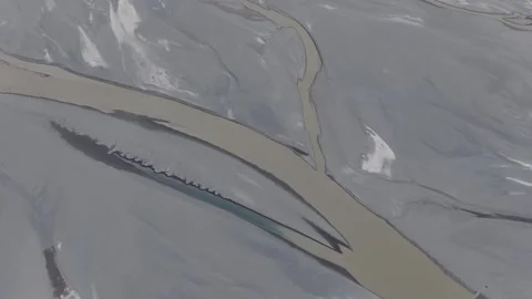 Aerial view of a river flowing through mountains in Pakistan, highlighting a Stock-Footage 314454200