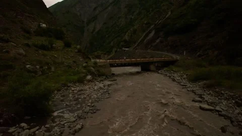 Aerial view of a river flowing through a rocky landscape in the Kavkaz mountains Stock Footage 318541089