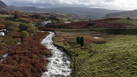 Aerial view of a river flowing through welsh valley 스톡 동영상 328246819