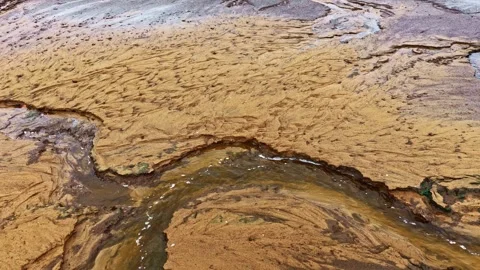 Aerial view of river flowing through sediment landscape, environmental concept Stockbeeldmateriaal 332762641