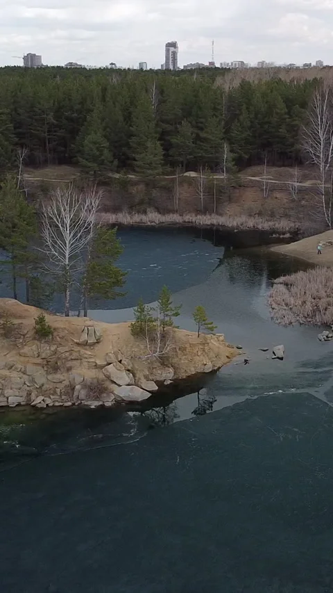 Aerial view of river flowing through forested landscape Stock Footage 347499361