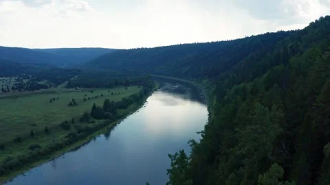 Aerial view of the river in the forest among the hills Stock-Footage 252248365