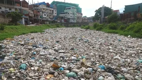 Aerial view of river with a high concentration of trash, Cambodia. Stock Footage 101528575