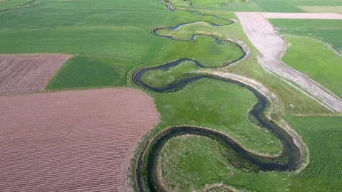 Aerial view of river meander flowing - Floodplain Fields and River Agriculture Stockbeeldmateriaal 339367299