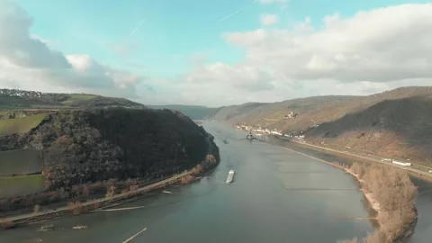 Aerial View Of River With Moving Barges, Trains, And Clouds Above. Video stock 297918290