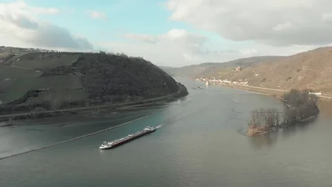 Aerial View Of River With Moving Barges, Trains, And Clouds Above. Video stock 297918547