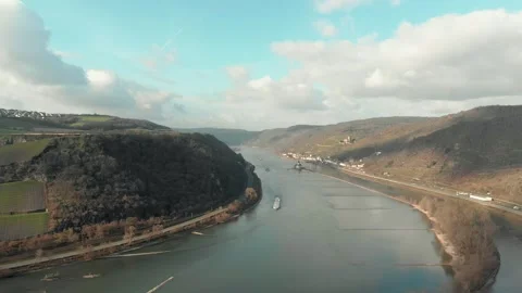 Aerial View Of River With Moving Barges, Trains, And Clouds Above. Video stock 297918950