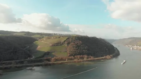 Aerial View Of River With Moving Barges, Trains, And Clouds Above. Video stock 297919363