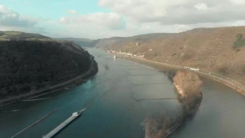 Aerial View Of River With Moving Barges, Trains, And Clouds Above. Video stock 297919395