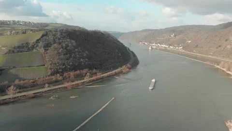 Aerial View Of River With Moving Barges, Trains, And Clouds Above. Video stock 297919401