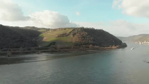 Aerial View Of River With Moving Barges, Trains, And Clouds Above. Video stock 297919671