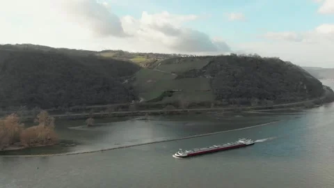 Aerial View Of River With Moving Barges, Trains, And Clouds Above. Video stock 297919740