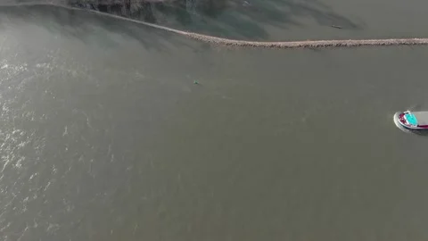 Aerial View Of A River With Moving Barges And Detailed Barge Close-Up. Video stock 297919886